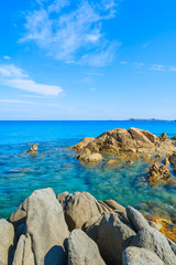 Rocks and azure sea water of Porto Giunco beach, Sardinia island