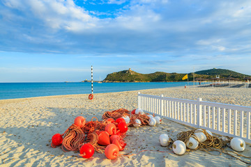 Swimming net and red buoys on Porto Giunco beach, Sardinia