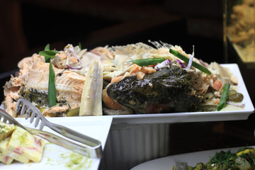 Baked fish on tray