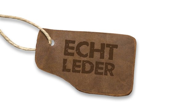 "Echt Leder" - Plakette auf wei&szlig; isoliert