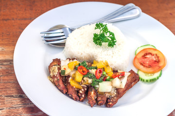 Fried chicken wing on rice