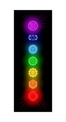 Glowing seven chakras on black background