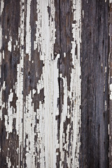 Old peeled off wooden planks surface background