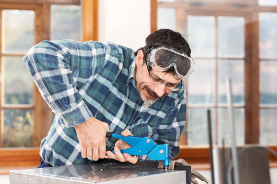 Metal worker in the workshop