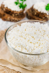 Fresh curd in glass bowl