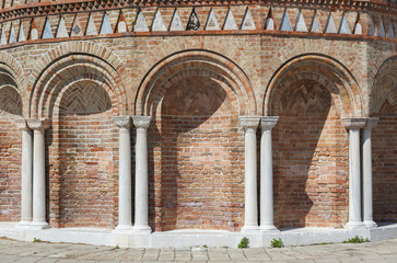 Luxurious wall with graceful columns and arches in Venice, Italy