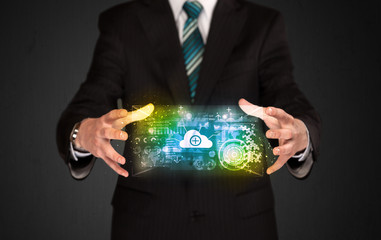 Businessman holding data cloud