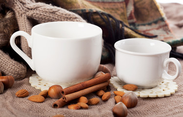 Close-up of two white coffee cups