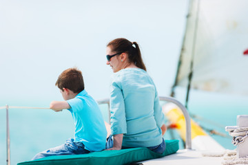 Family sailing on luxury yacht