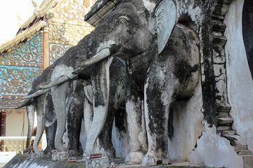 Elephant statue on chedi.