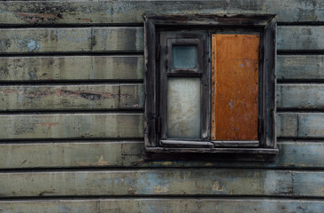 Obraz na płótnie Canvas Old wooden window and wall in Tallinn, Estonia
