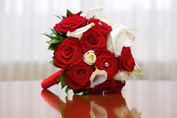 beautiful bridal bouquet of roses at a wedding party