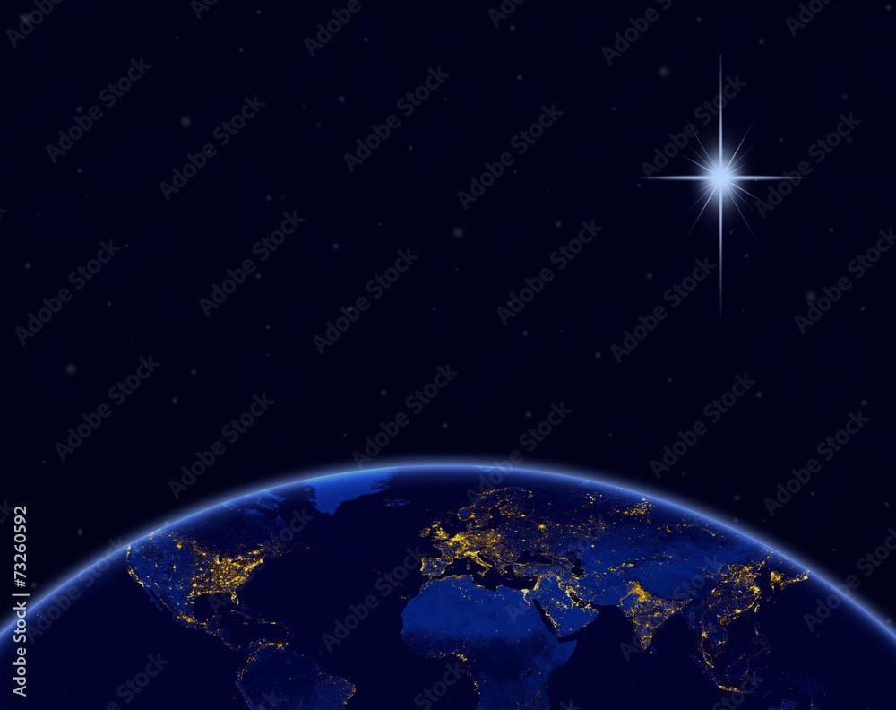 Wall mural planet earth and christmas star in night sky