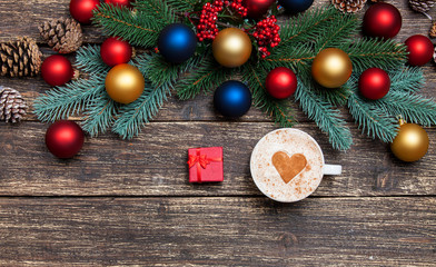 Fototapeta na wymiar Hot cappuccino with heart shape and gift