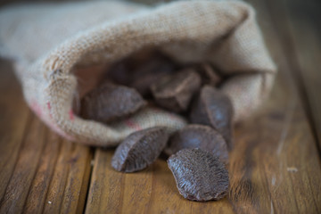 Brazilian nuts in sack on table