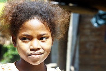 Cute young black African girl - poor child, madagascar
