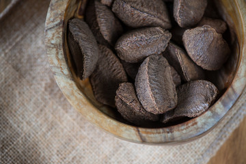 Table top view on brazilian nuts in bowl