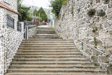 Fototapeta na wymiar a street with stairs in Manteigas town - Portugal