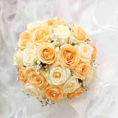 beautiful bridal bouquet of roses at a wedding party