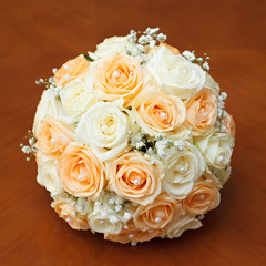 beautiful bridal bouquet of roses at a wedding party