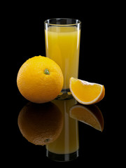 Glass of orange juice with fruit