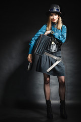 beautiful steampunk woman with bag on black.
