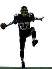 Foto op Plexiglas triumphant american football player man silhouette © snaptitude