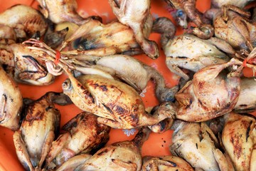 Boiled quail for sale at the market.