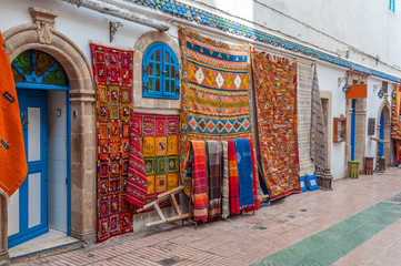 Oriental carpets for sale in the medina of Essaouira, Morocco - obrazy, fototapety, plakaty