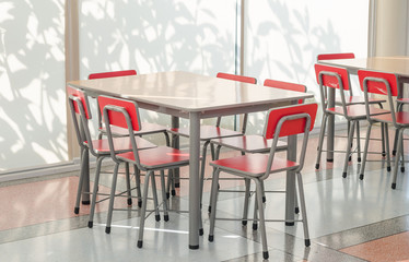 Empty tables and chair in school libary