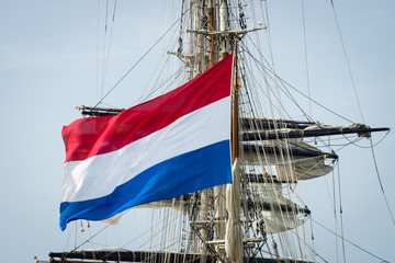 Flag of the Netherlands and the sailing ship.