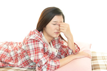 頭痛を訴える女性