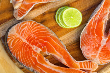 Fresh salmon fillet with lemon - healthy food concept