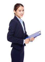 Businesswoman with clipboard