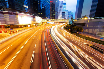 Fototapeta na wymiar blur motion traffic lights of modern urban city at night