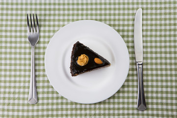 plate with a piece of chocolate cake. top view