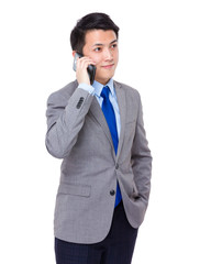 Asian businessman talk to cellphone