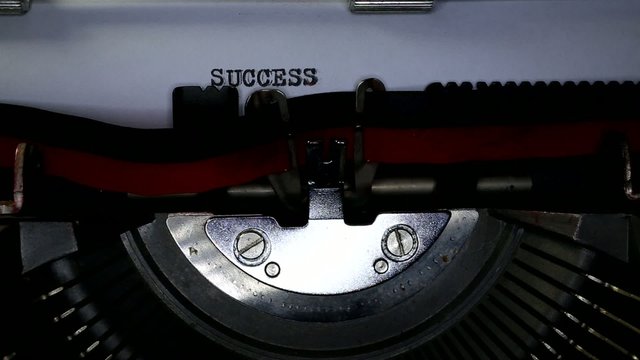 TYPEWRITER with SUCCESS in the paper