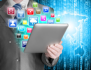 Business man use tablet pc with colorful application icons