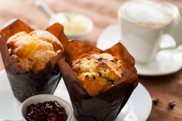 Fresh Muffins with coffee.