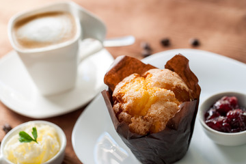 Muffin with coffee.