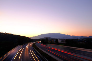 Sunset on buzy highway