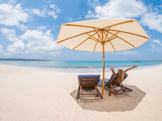 girl have a seasonal winter vacation on the beach