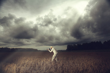 traveler in autumn mystical forest view from the back