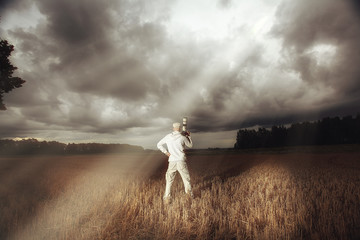 traveler in autumn mystical forest view from the back