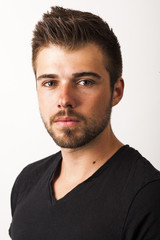 Fototapeta premium Junger smarter Mann mit Gel in den Haaren