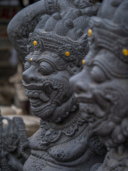 Stone sculpture on entrance door of the Temple in Bali