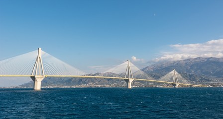 Fototapeta na wymiar Suspension bridge across a sea