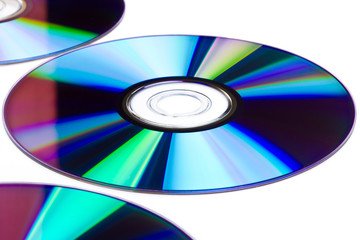 Cds and dvds on white background