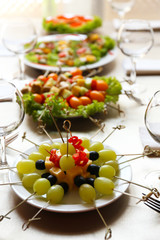 Restaurant table setting with tasty food